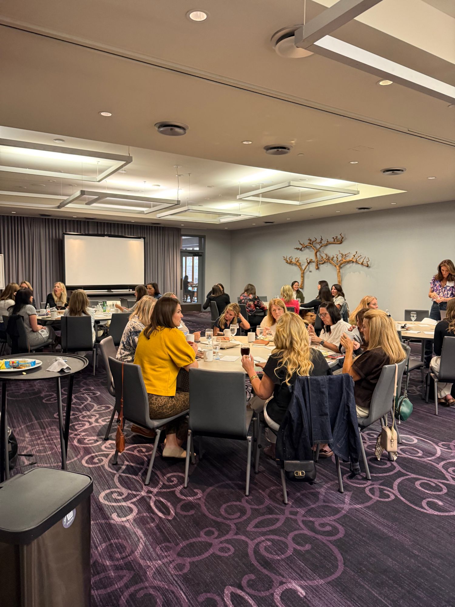 Attendees in session at leadHER Summit, Napa CA